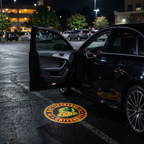 UniGlow HBCU car door projector - Florida A&M orange and green emblem