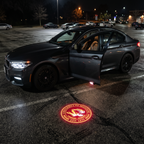 UniGlow HBCU car door projector - Tuskegee crimson and gold tiger emblem
